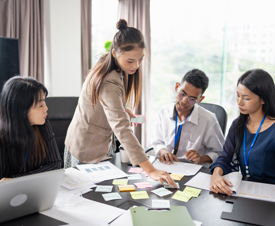Group of colleagues working together at a table.