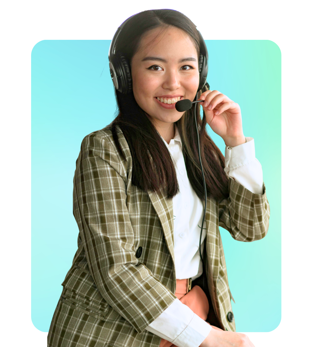 A young woman smiling while wearing headset with a microphone